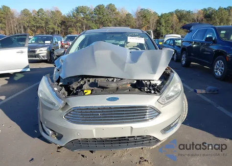 2015 Ford Focus Titanium from USA, damaged, VIN 1FADP3J23FL304788